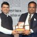 CM Devendra Fadnavis Felicitates Dr. Rajendra Pratap Singh of Yogayatan Group at Realty Business Achievers Awards 2016
